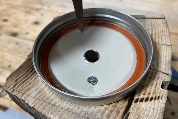 Attaching a lid to the carpenter bee trap